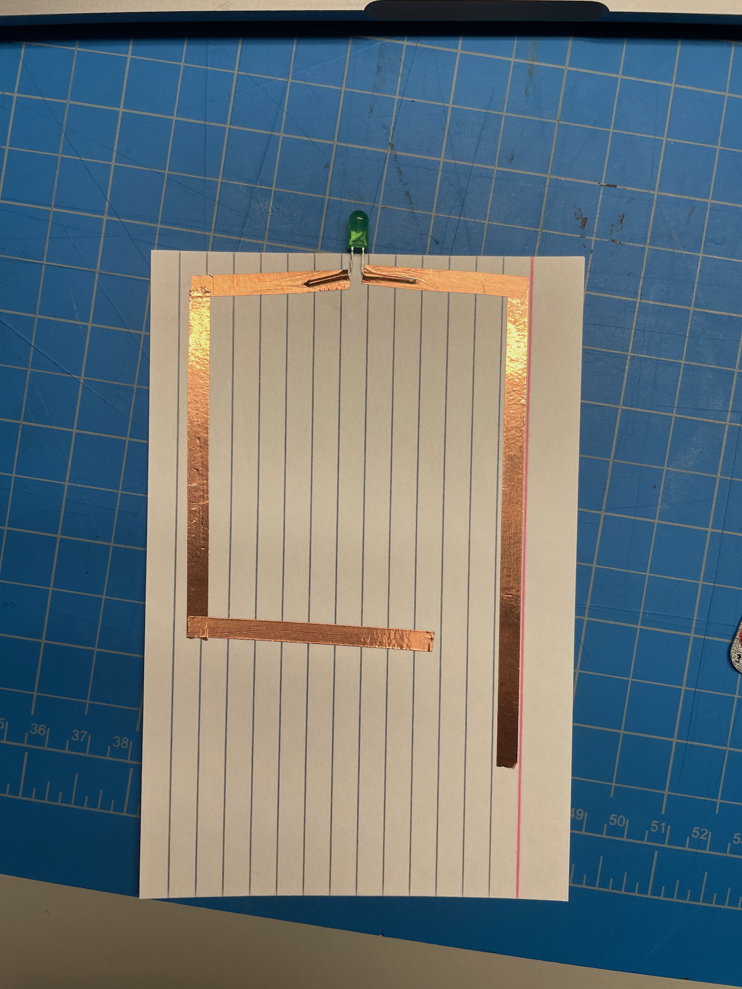 This is a close up of the first circuit I needed to make. When chatting with Jen I learned more 
                  about how the resources work together and how they will be useful. Additionally, I was informed on 
                  how the copper tape is not very conductive on the bottom where the adhecive is.